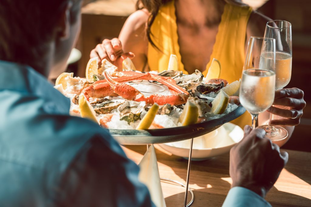 eating crabs at restaurant