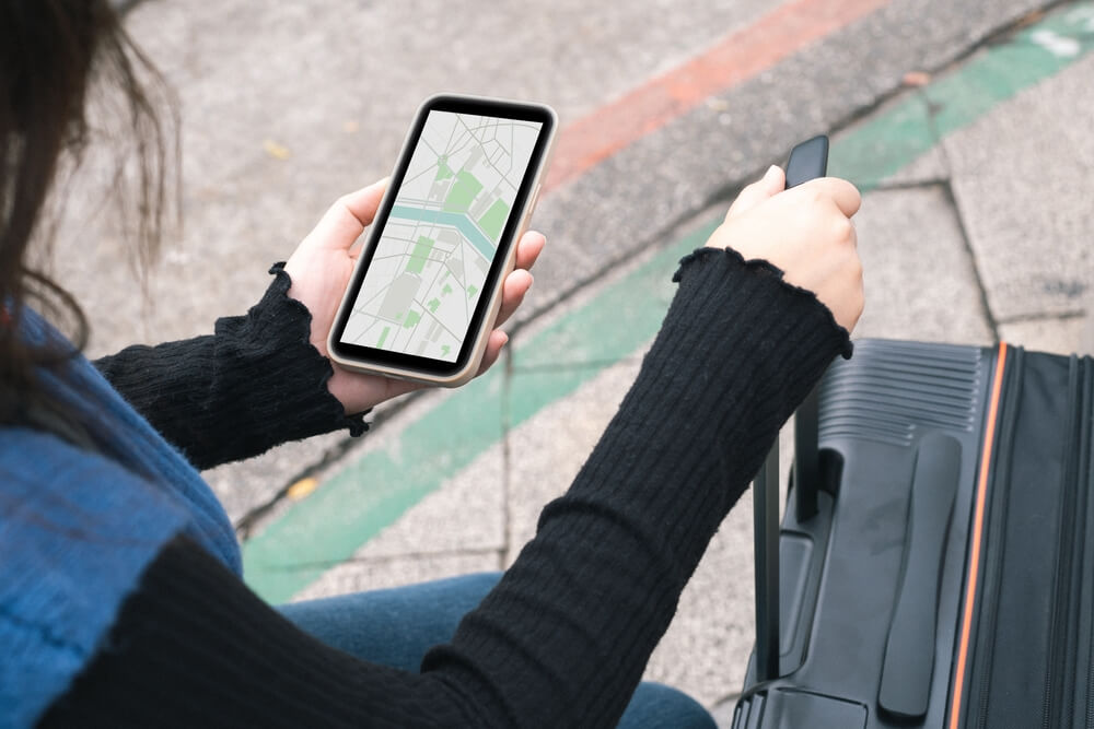 woman using an interactive map on mobile